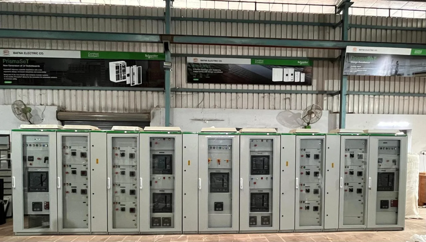 Wide bank of electrical switchgear panels in the Bafna Electric workshop